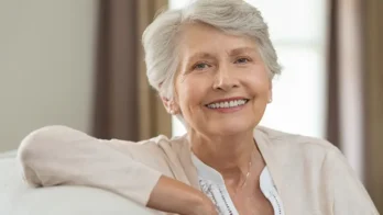 Live-in caregiver helping senior in Ontario home